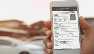 CRLV (Certificado de Registro e Licenciamento do Veículo) em tela de smartphone (Foto: Divulgação/Governo MS)