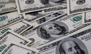 O dólar comercial encerrou esta segunda-feira (30) vendido a R$ 5,115, com alta de 0,06%. (Foto: Reuters)