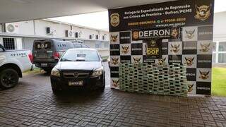 Mais de 150 kg de pasta base foram encontrados em veículo com placa de Rondonópolis. (Foto: Reprodução/Polícia Civil)
