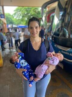 Camila com os filhos gêmeos indo para o campeonato em Brasília.