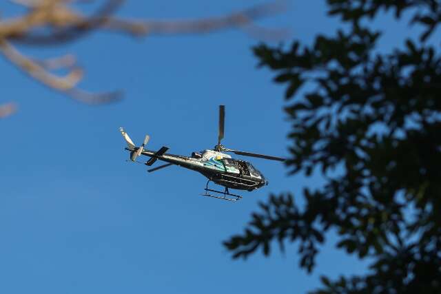 Helic&oacute;ptero e guardas come&ccedil;am opera&ccedil;&atilde;o depois de onda de amea&ccedil;as fakes