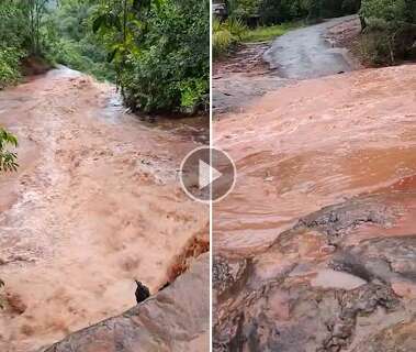 Após fortes chuvas, cachoeira no Morro Paxixi transborda com água barrenta