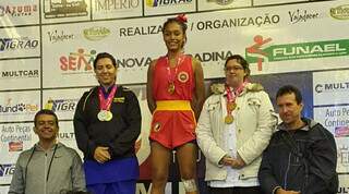 Atleta Anná Guerra no primeiro lugar de competição (Foto: Divulgação)