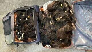 Malas contendo cabelo humano, avaliados em R$ 150 mil, que foram roubadas em Corumbá (Foto: Diário Corumbaense)