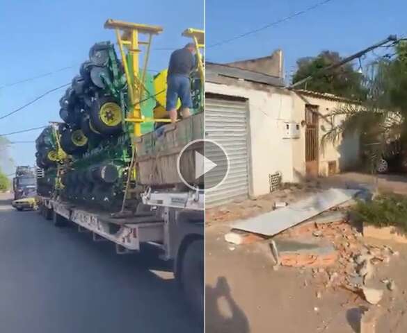 Caminh&atilde;o carregando maquin&aacute;rio arranca fia&ccedil;&atilde;o e destr&oacute;i fachada de loja