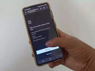 Tentativa de acesso ao site da Cassems pelo smartphone. (Foto: Jackeline Oliveira)