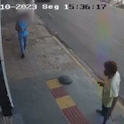 Comerciantes assustados: vídeo mostra morador de rua atirando pedra em ótica