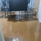 Chuva foi rápida, mas deixou casa inundada e muita sujeira no Macaúbas