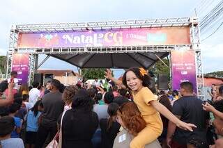 Criança participa de evento do do “Natal de CG é Tamanho Família&#34;, em Campo Grande (Foto: Divulgação)