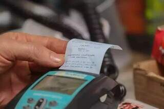 Maquina de transações de cartões de crédito (Foto: Arquivo/Marcos Maluf)