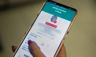 Aplicativo do e-Título no celular. (Foto: Marcello Casal Jr/Agência Brasil)
