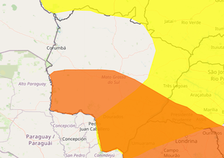 Área em laranja indica chance de tempestade e em amarelo para chuva intensa (Arte: Inmet)