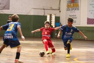 Jogadores durante jogos anteriores da competição (Foto: Divulgação)