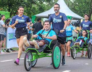 Membros do Pernas Solidárias participando de evento em 2024 (Foto: Acervo Pessoal)