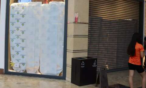 Arma disparou quando PM mexia na cal&ccedil;a em loja no shopping, diz delegado
