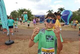 Com incentivo da fam&iacute;lia, pequenos atletas correm e se divertem em maratona kids