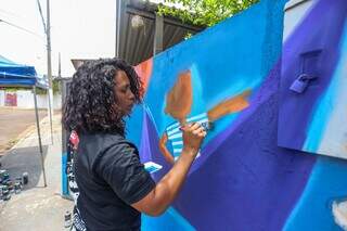 Inspirado em bolo gigante, barquinho de Lourde virou mural 