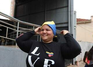 Com saudades de casa, venezuelanos comemoram pris&atilde;o de Maduro