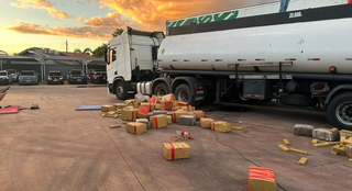 Motorista &eacute; preso transportando oito toneladas de drogas, arma e muni&ccedil;&otilde;es 