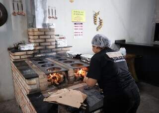 Em restaurante mineiro, mural é gigante e a fama da rabada também Em restaurante mineiro, mural é gigante e a fama da rabada também