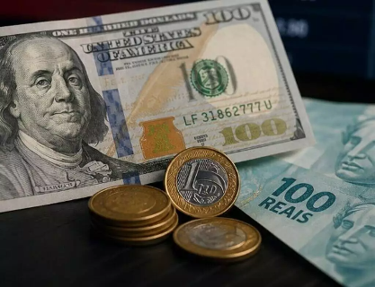 D&oacute;lar fecha em queda a R$ 5,10 ap&oacute;s taxa de juros cair para 14%