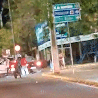 Grupo destr&oacute;i carro de casal de haitianos a capacetadas no Parque dos Poderes