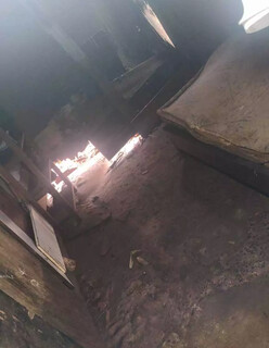Enxurrada invade barracos e mobiliza moradores da Comunidade Esperança Enxurrada invade barracos e mobiliza moradores da Comunidade Esperança