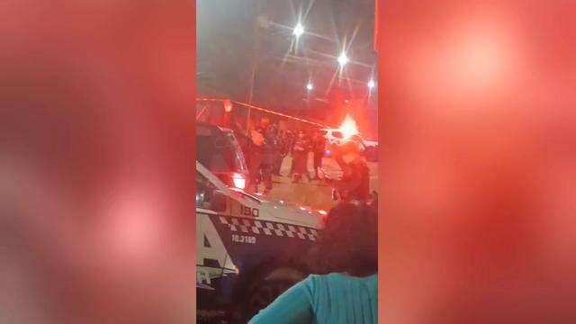 Movimentação em frente a tabacaria onde jovem foi executado a tiros